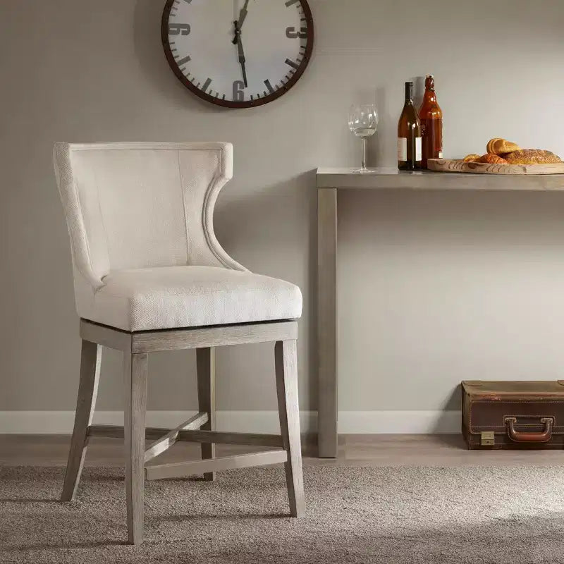 Sgabello da bancone girevole color crema, imbottito, 1 posto